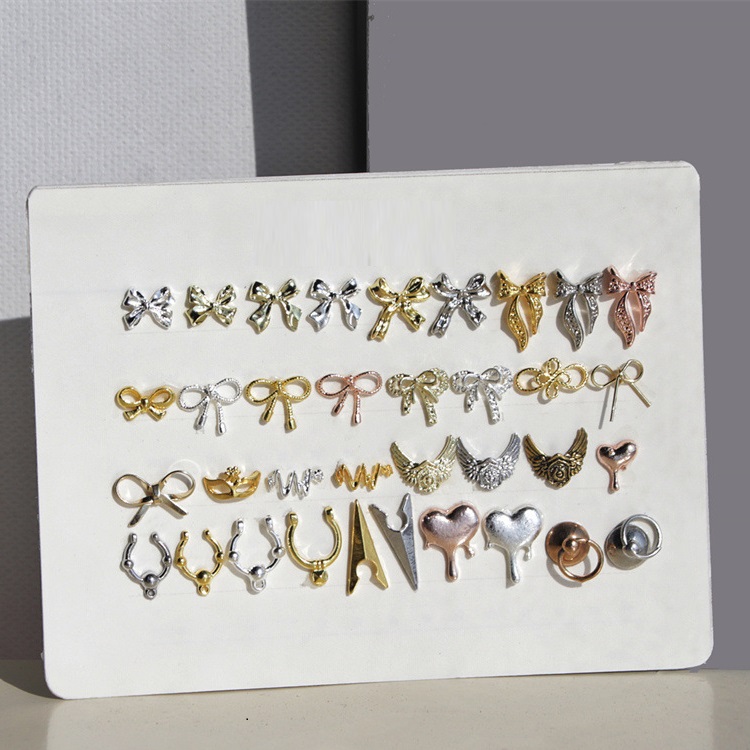 The new explosive alloy love retro simple metal double bow French American style nail jewelry
